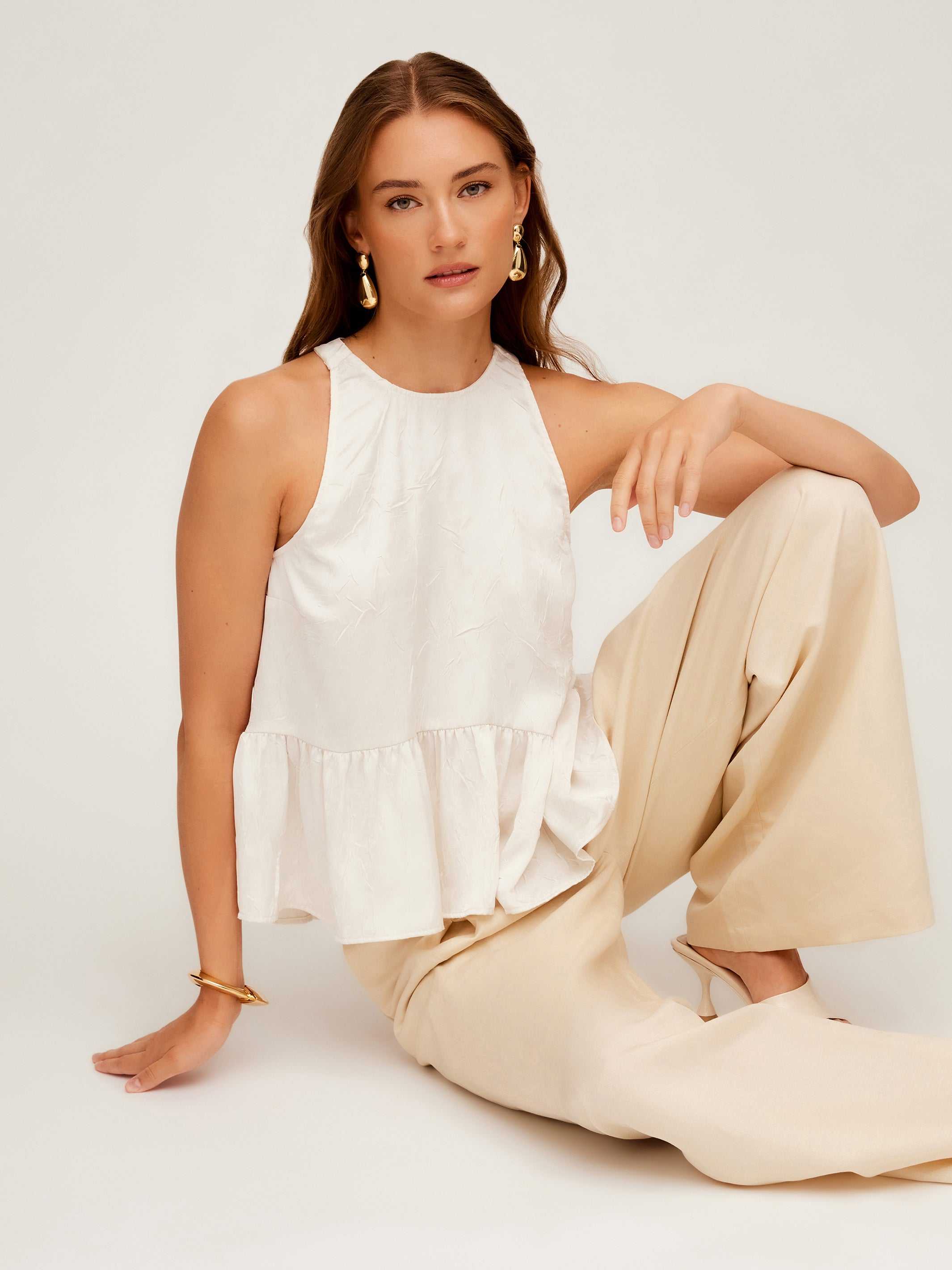 Floren Ruffle Hem Halter Top